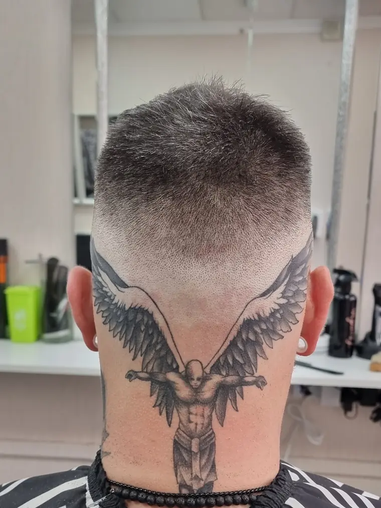 Skin fade with angel wing neck tattoo, Kurdistan Barbers